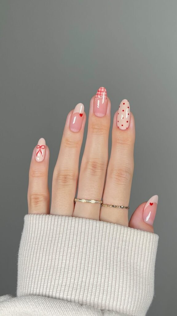 French - style nude rhinestone manicure