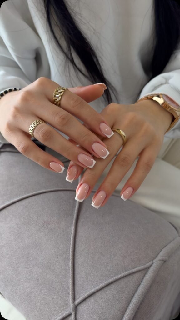 French - style nude rhinestone nails